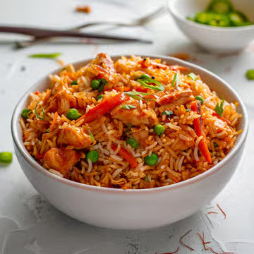 CHICKEN SCHEZWAN FRIED RICE